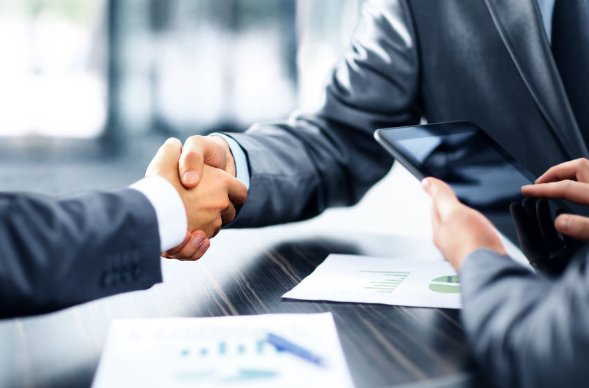 49572474 - business people shaking hands